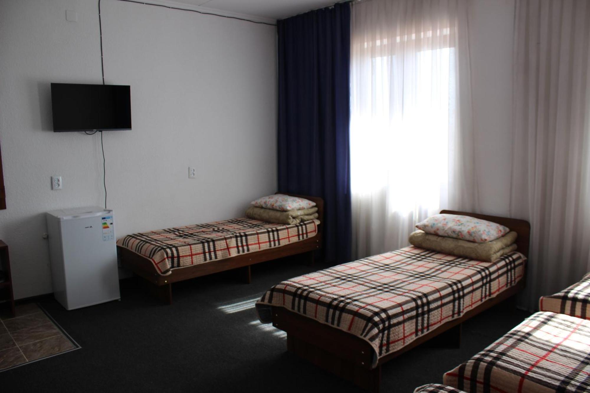 Wings Art Hotel Cholponata Buitenkant foto