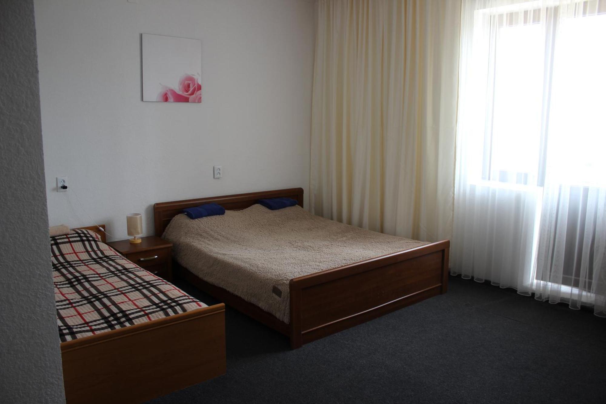 Wings Art Hotel Cholponata Buitenkant foto